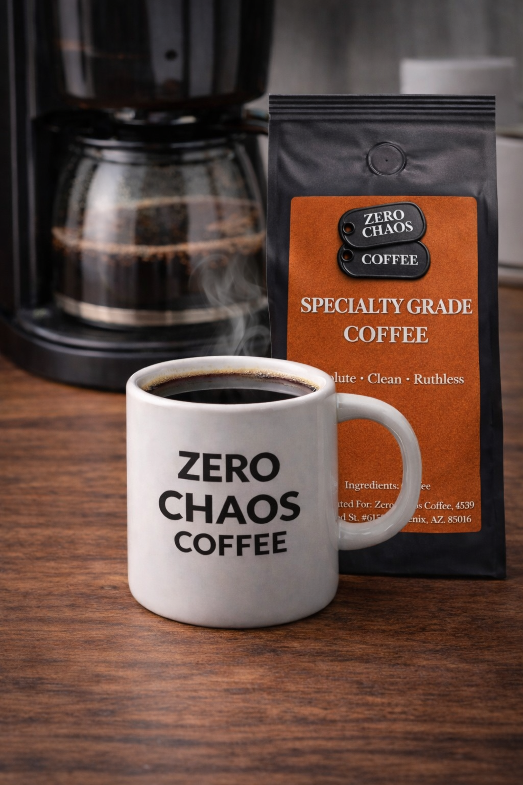 Zero Chaos Coffee mug with black drip coffee beside specialty grade coffee bag and drip machine — Zero Chaos Coffee