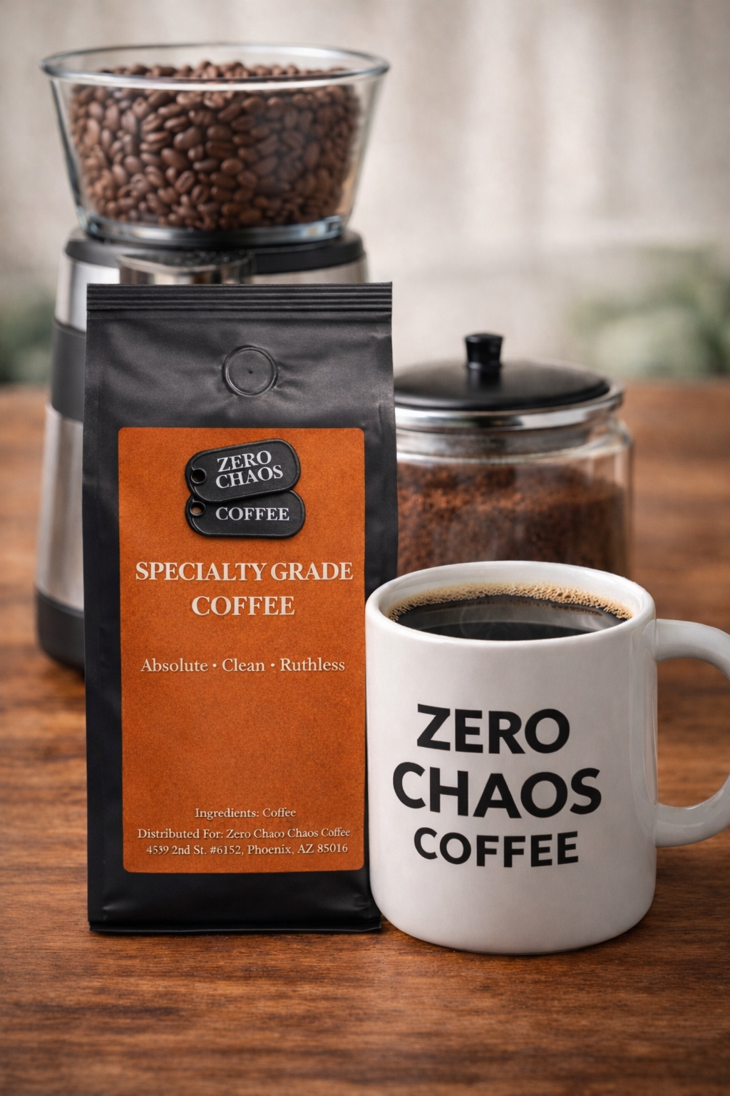 Zero Chaos Coffee bag beside mug and burr grinder with whole bean hopper — Zero Chaos Coffee