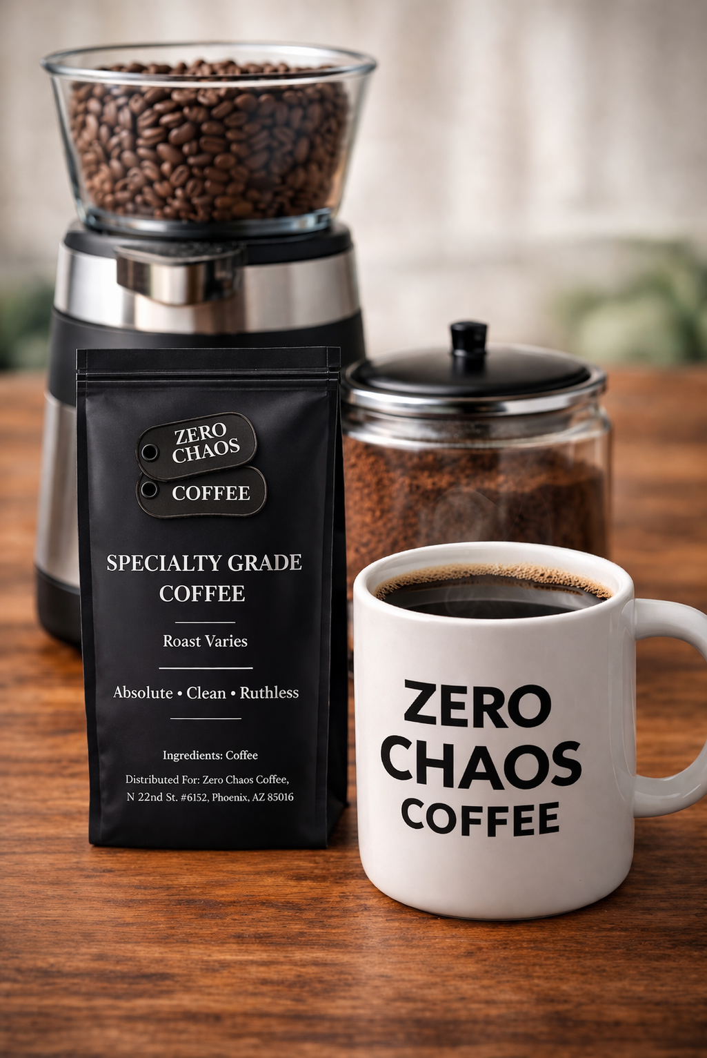 Zero Chaos Coffee bag beside mug and burr grinder with whole bean hopper — Zero Chaos Coffee
