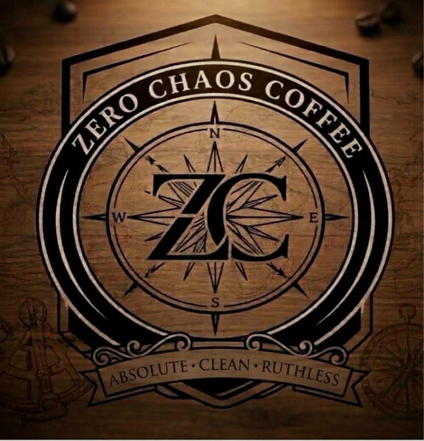 Zero Chaos Coffee logo: a dark compass crest on a wood background, with the ZC monogram at the center of a compass rose, "Zero Chaos Coffee" arched across the top, and a ribbon reading "Absolute · Clean · Ruthless."