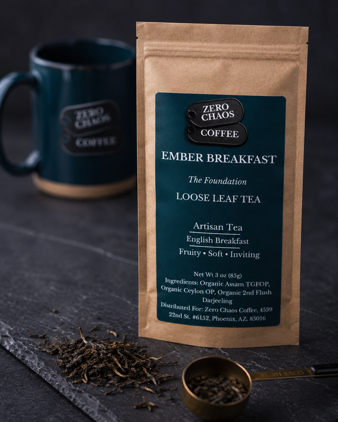Ember Breakfast tea tin on dark slate with mug in background — Zero Chaos Coffee Ember Breakfast